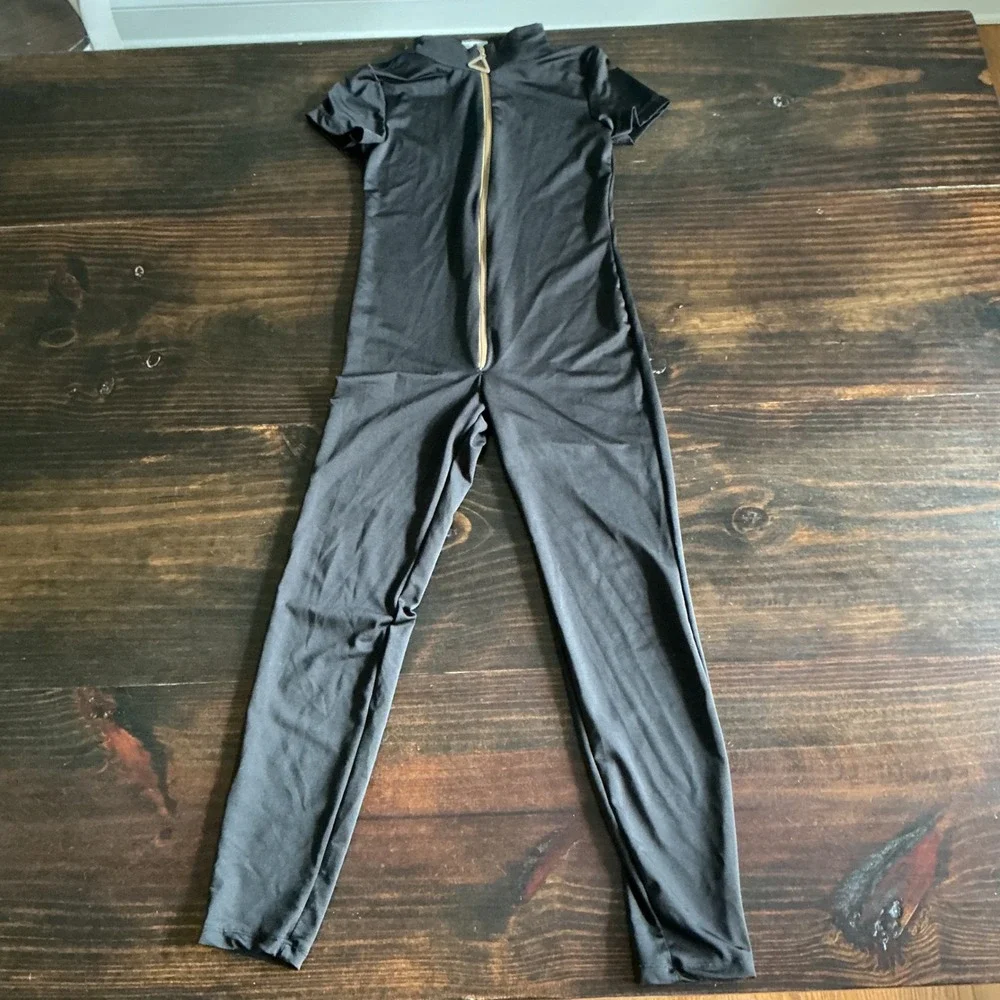 Spirit Halloween Carmen Sandiego Kids Jumpsuit Black Gold Zip Cosplay Medium